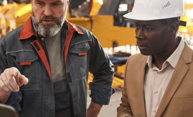 foreman-presenting-new-equipment-to-engineer-2023-11-27-05-12-49-utc(square)