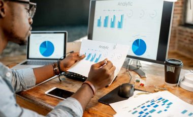 man-working-with-analytics-at-the-office-2025-03-16-03-24-45-utc (1)