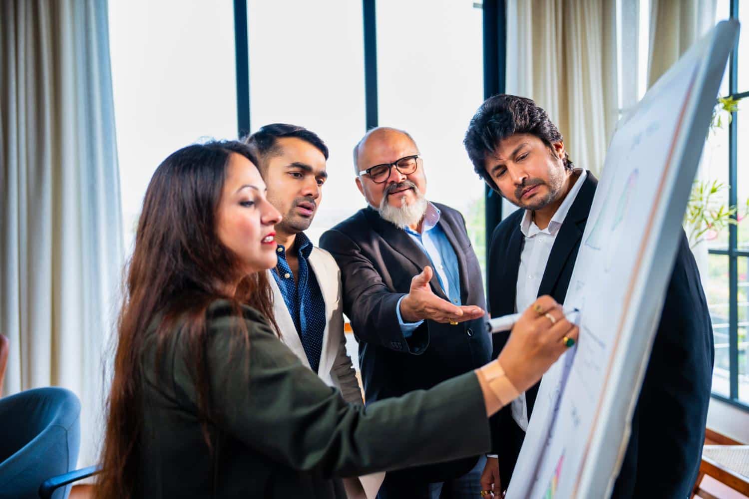 indian-asian-corporate-team-discussing-a-strategy