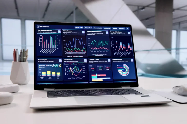 operational excellence metrics on a laptop screen in conference room